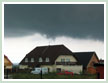 Dark clouds bringing rain.
