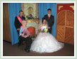 Newly-weds with witnesses to the wedding